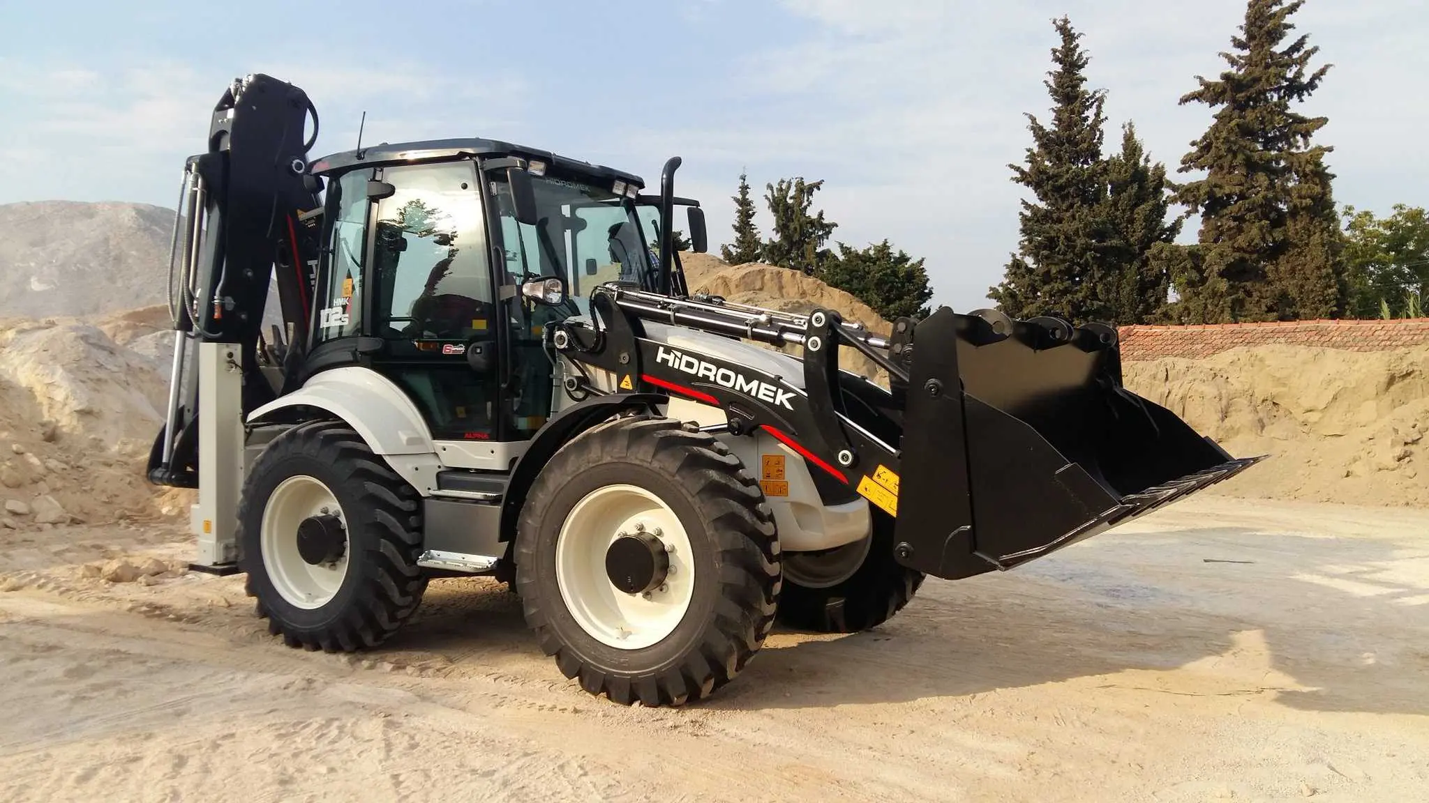 Аренда экскаватора-погрузчика Hidromek 102S Alpha